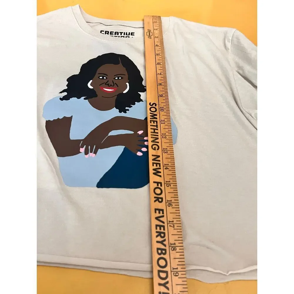 ☀️Creative Action Network Michelle Obama Crop Graphic T-Shirt Beige Women's L - Picture 5 of 5